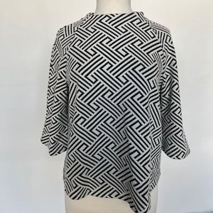 Black and white mock neck blouse